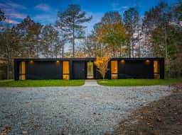 Designer's Glass Waterfront Lakehouse - Image 2