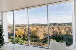 A modern light-filled haven in a tranquil setting - Image 5