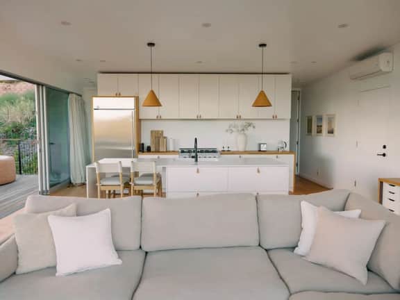 A modern light-filled home with views of the woods - Image 3
