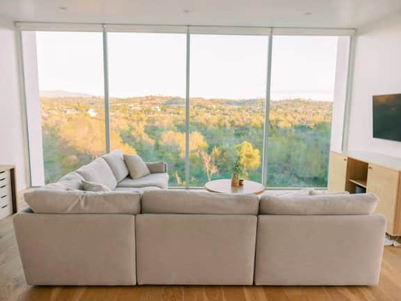 A modern light-filled home with views of the woods - Image 4